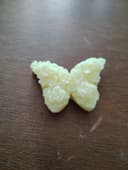 Logo en forme de papillon c'est le fondant parfumé le plus vendu.
